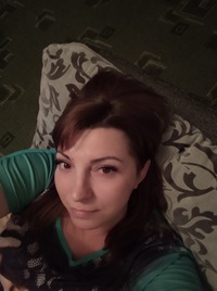 Оля Титова